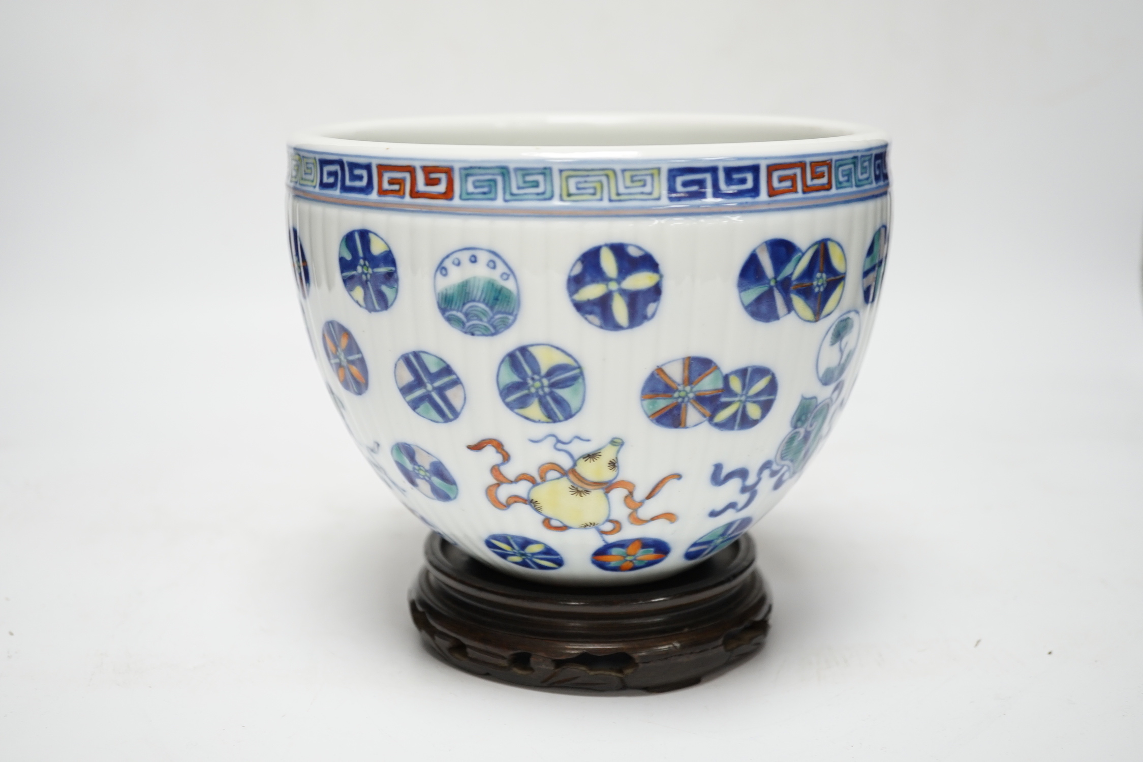 A Chinese doucai jardiniere on stand, 15.5cm high